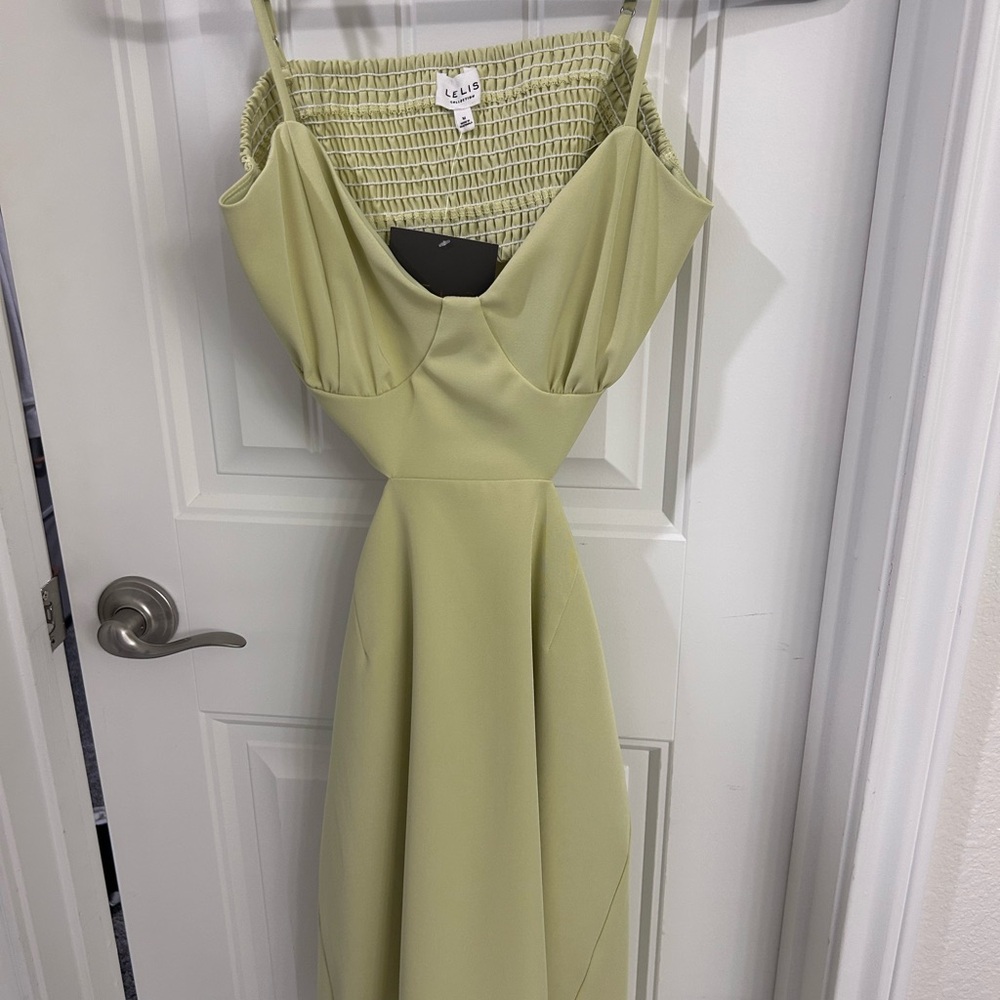 Lelis green cocktail dress with cut outs